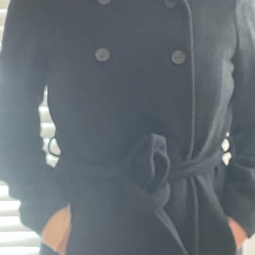 Zara’s charcoal grey, hooded coat.